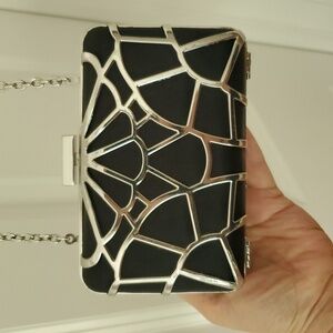 BCBGMaxAzria Caged Black and Silver Clutch Bag